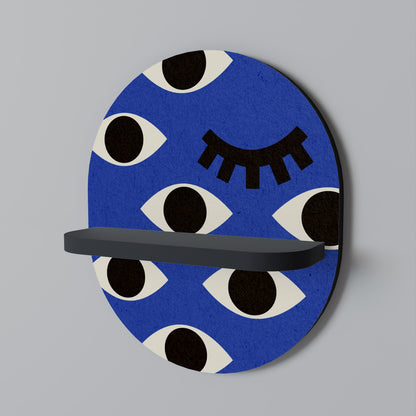 GEOMETRIC EYES Oval Art Shelf In Black Finish